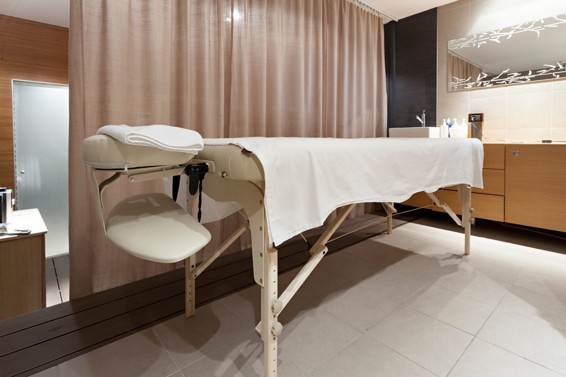 Massage bed in spa interior